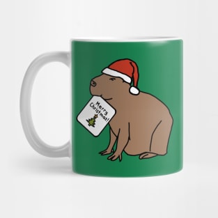 Cute Capybara says Merry Christmas Mug